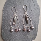 Boho style silver earrings with natural pearls and black tourmaline.