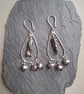 Boho style silver earrings with natural pearls and black tourmaline.