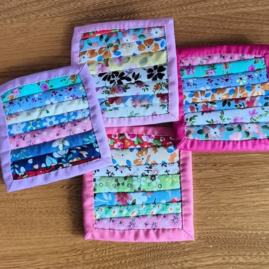 Lovely set of four pretty quilted coasters