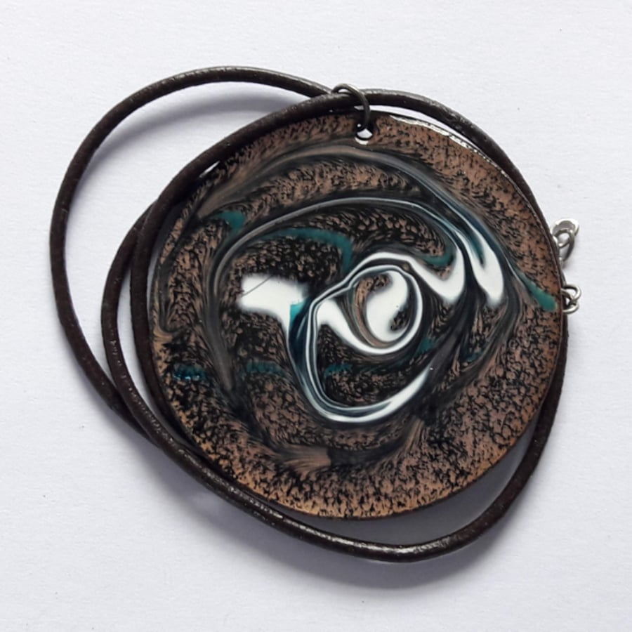 large enamel pendant - scrolled white and dark green on black over clear enamel