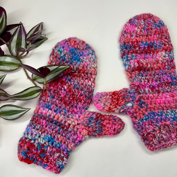 Crocheted mittens made from hand spun 100% merino wool.