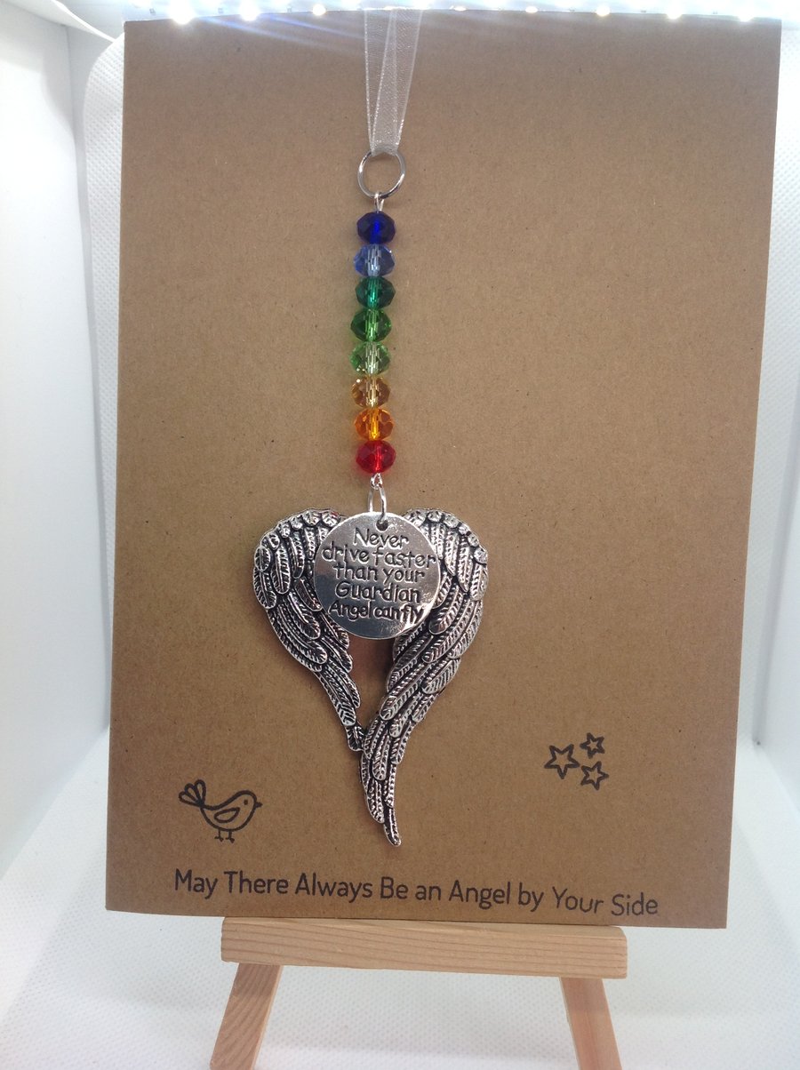 Handmade suncatchers for car rear view mirror, attached to greetings card