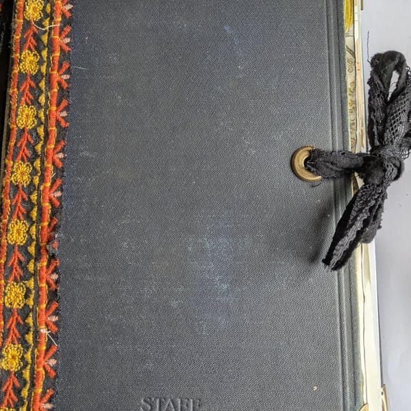 Repurposed book into a journal for keeping notes ,art work , scrapbook and much 
