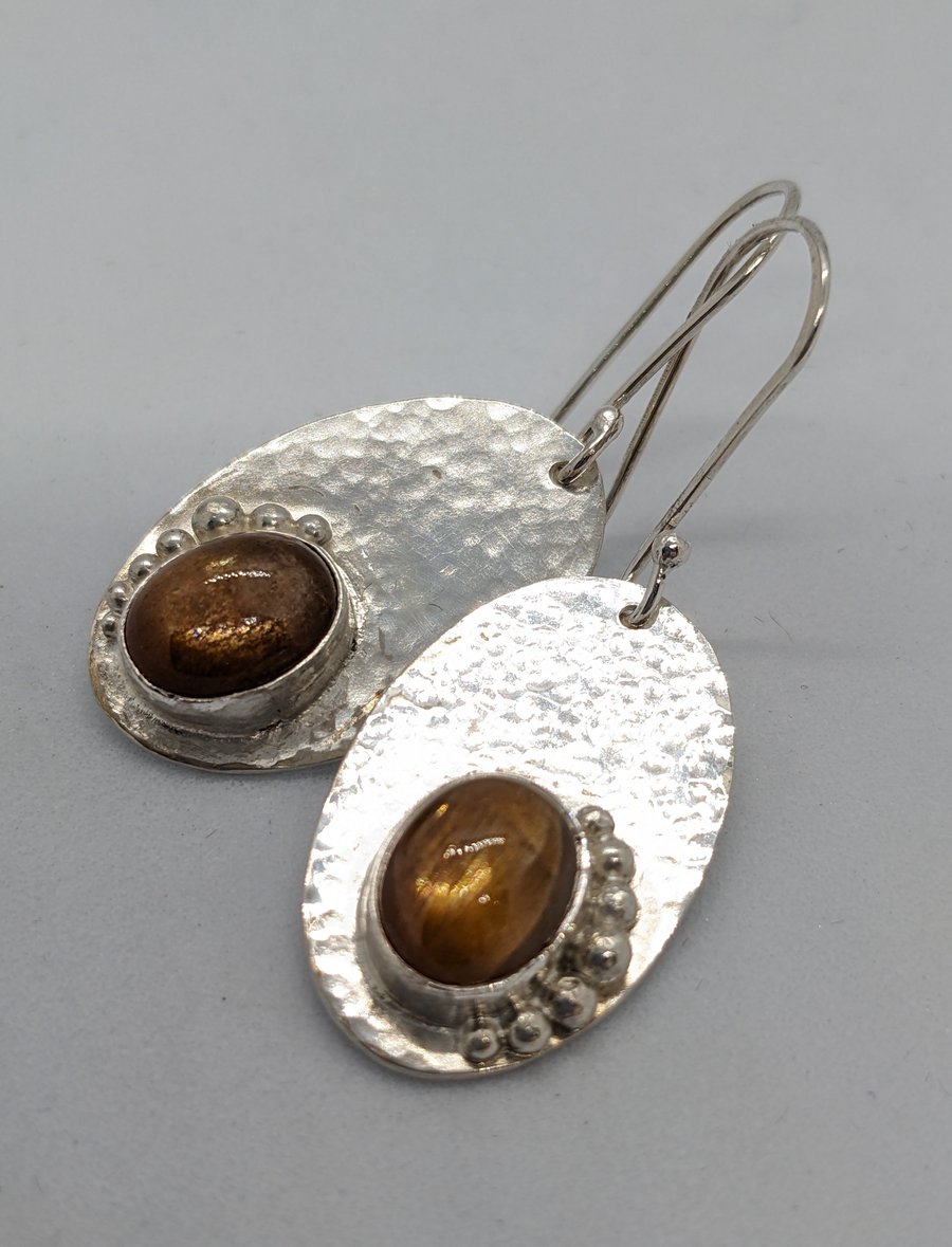 Handcrafted sterling silver earrings with sun stones