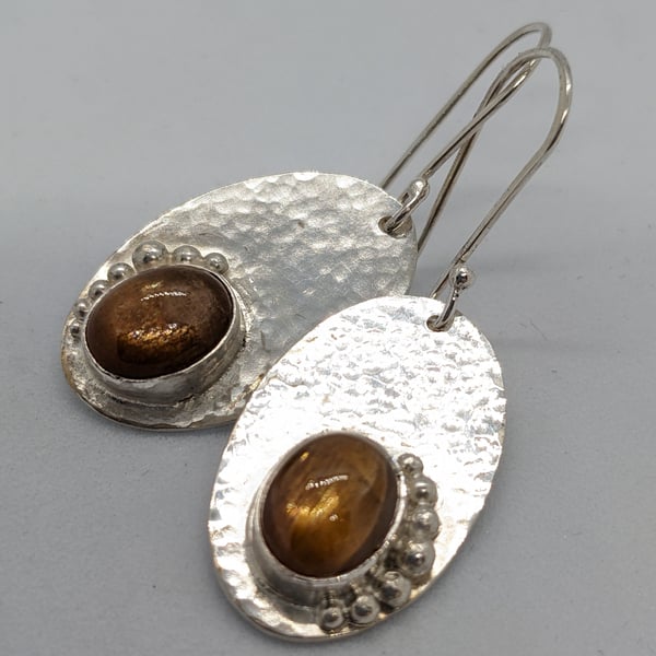 Handcrafted sterling silver earrings with sun stones