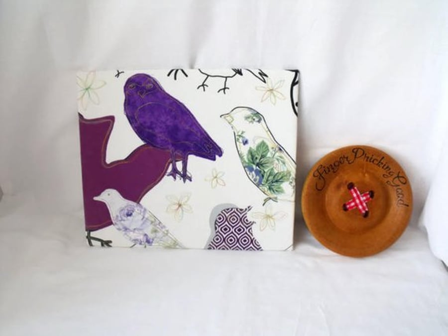 unusual purple bird applique canvas picture, aprox 10.5 x 12.5 inches
