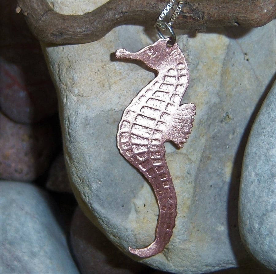 Seahorse pendant in etched copper