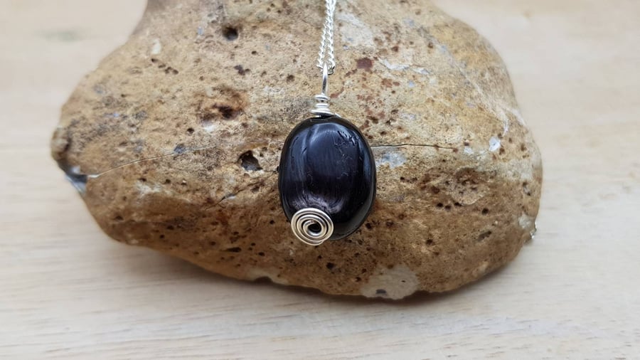 Black Hypersthene pendant necklace. Silver plated wire wrapped