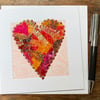 Up-cycled pink and gold sparkly embroidered heart card. 