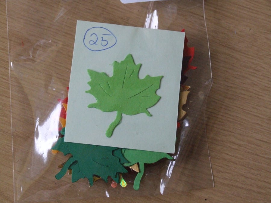 25 maple leaf shaped Sizzix die cuts for card embellishments & crafting.