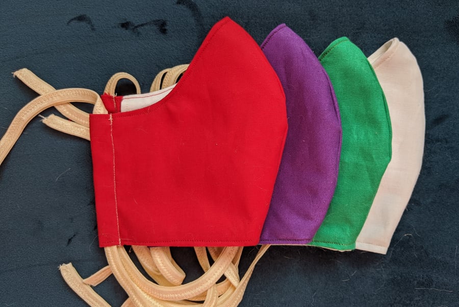 Set of four solid colour face coverings in liturgical colours