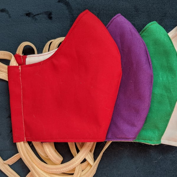 Set of four solid colour face coverings in liturgical colours