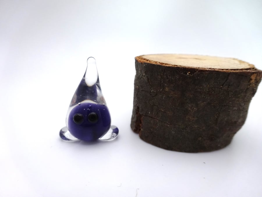 small glass wisp figure