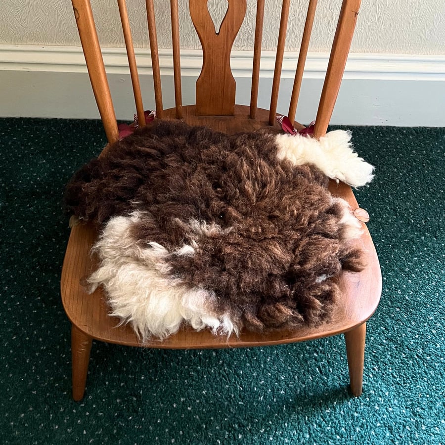 Natural wool felted seat-pad and or a mat for a cat or a small dog  