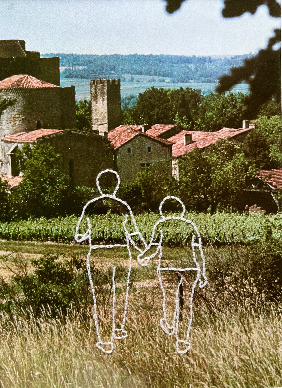 Hand embroidered vintage book page