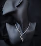 Wavy silver pendant with pebbles - Image 1