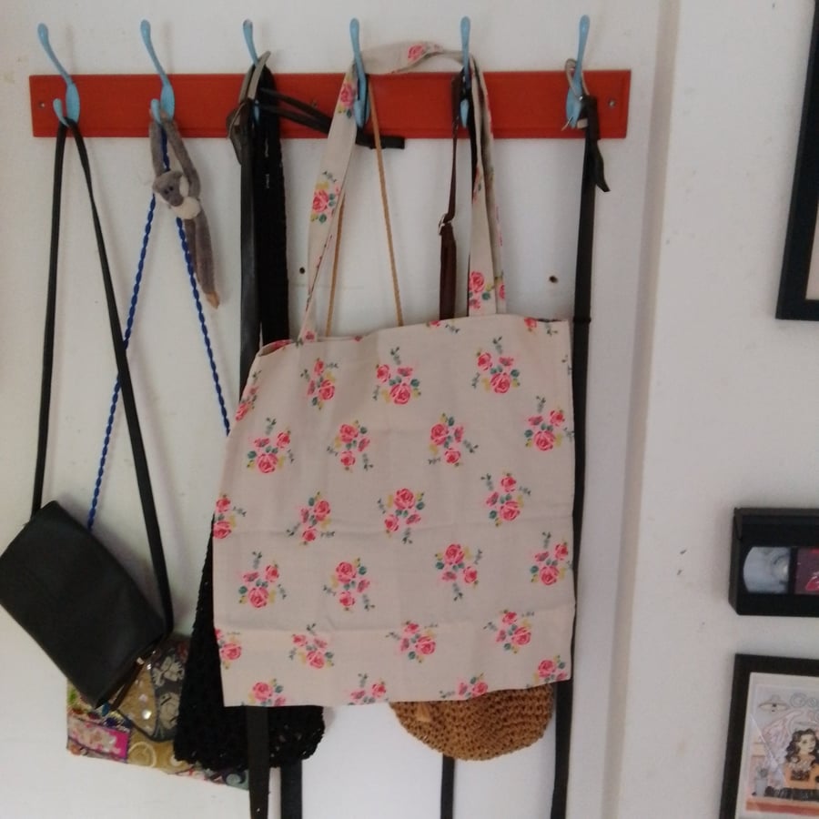 Tote bag handmade using floral fabric.
