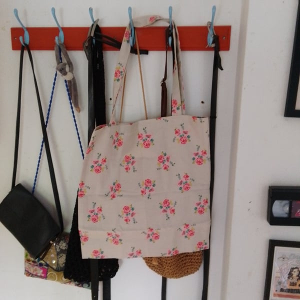Tote bag handmade using floral fabric.