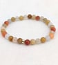 Frosted golden jade gemstone stretch bracelet  - Image 9