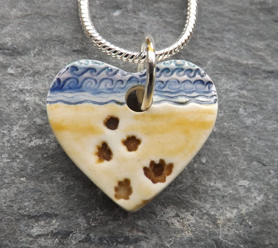 Handmade ceramic paw prints on my heart pendant