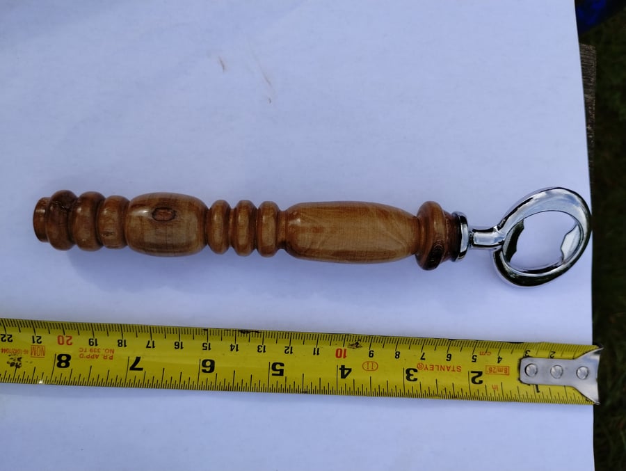 turned wooden bottle opener with Steel end