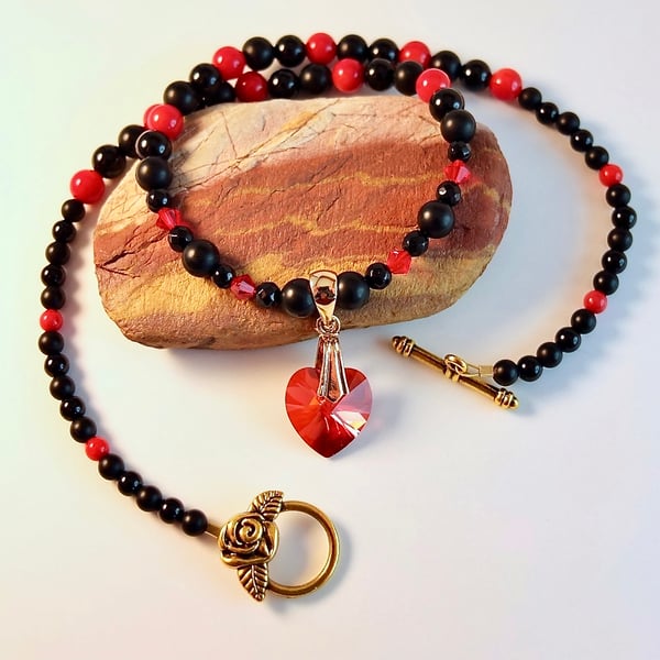 Ruby Red Swarovski Crystal Heart, Black Onyx And Red Bamboo Coral Necklace.