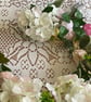 Handmade floral multi coloured, multi flowered garland table decoration. - Image 2