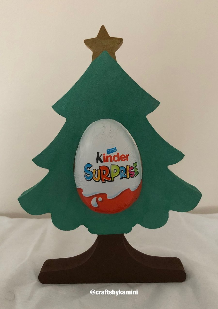 Pre-order: Christmas Tree holding a Kinder Egg
