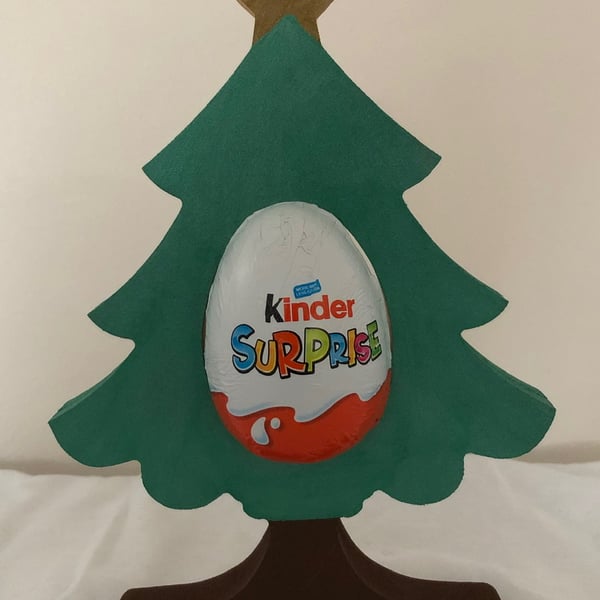 Pre-order: Christmas Tree holding a Kinder Egg