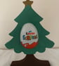 Pre-order: Christmas Tree holding a Kinder Egg