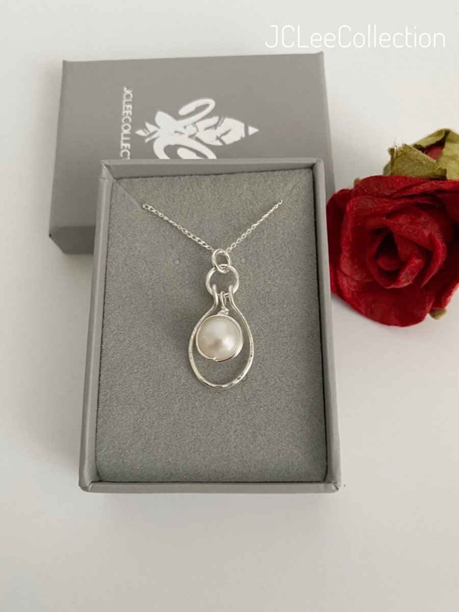 Ivory Pearl Pendant Necklace with Silver Wrapping and Silver Oval Dangle