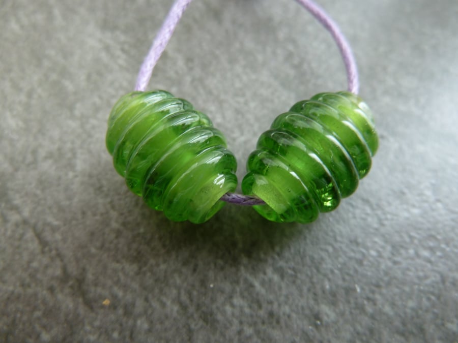 green oval lampwork glass beads