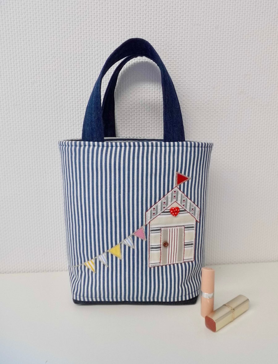Tote hand bag with a beach hut scene blue and white stripes