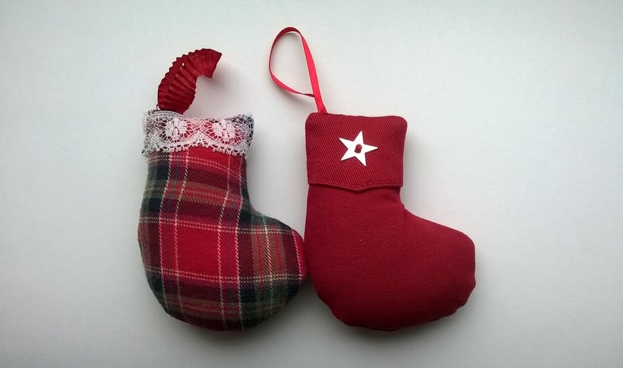 Two mini handmade Christmas tree stockings