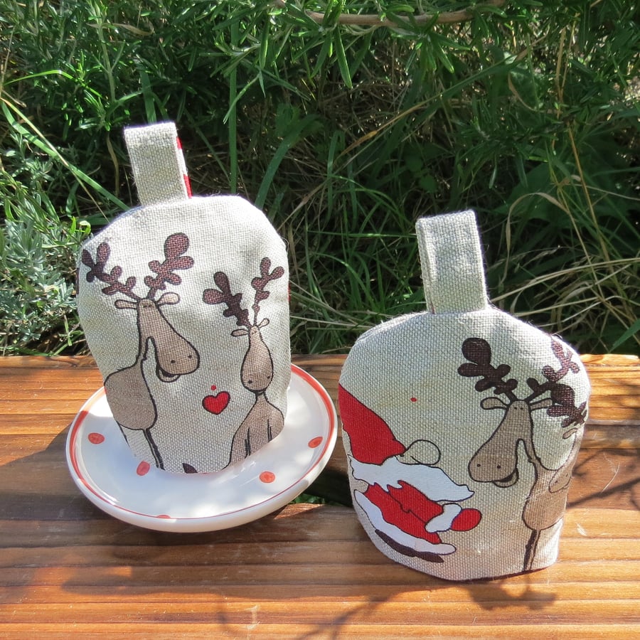 Set of two festive egg cosies.  Christmas.