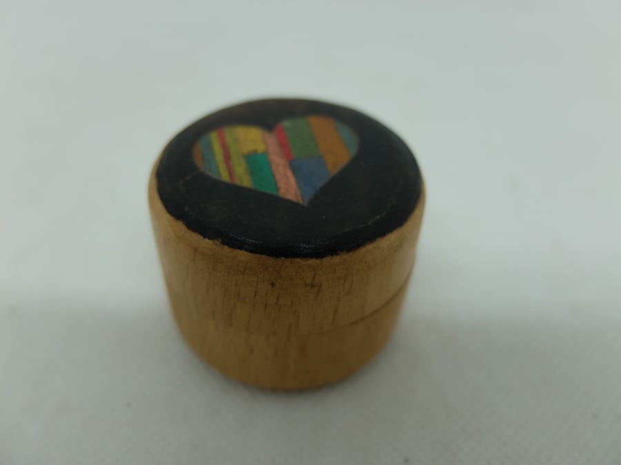 Small round wooden pot with colourful veneered lid