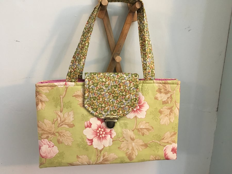 A New Handbag for Spring. A Bright and Stylish Look with a  Floral Design.