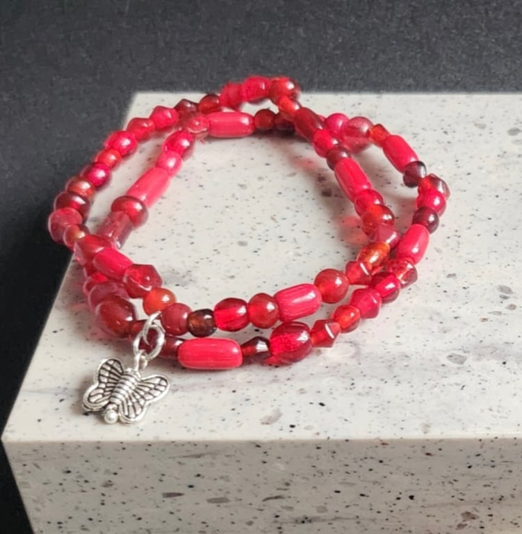 Red Stacking Bracelet with a Butterfly Charm 