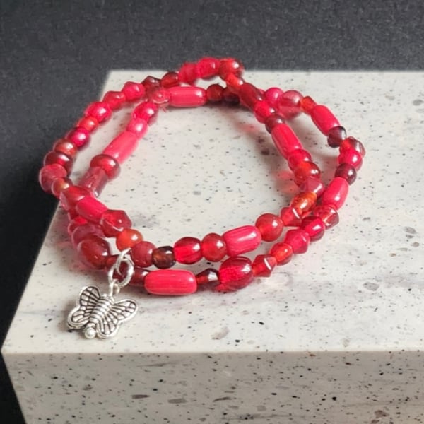 Red Stacking Bracelet with a Butterfly Charm 