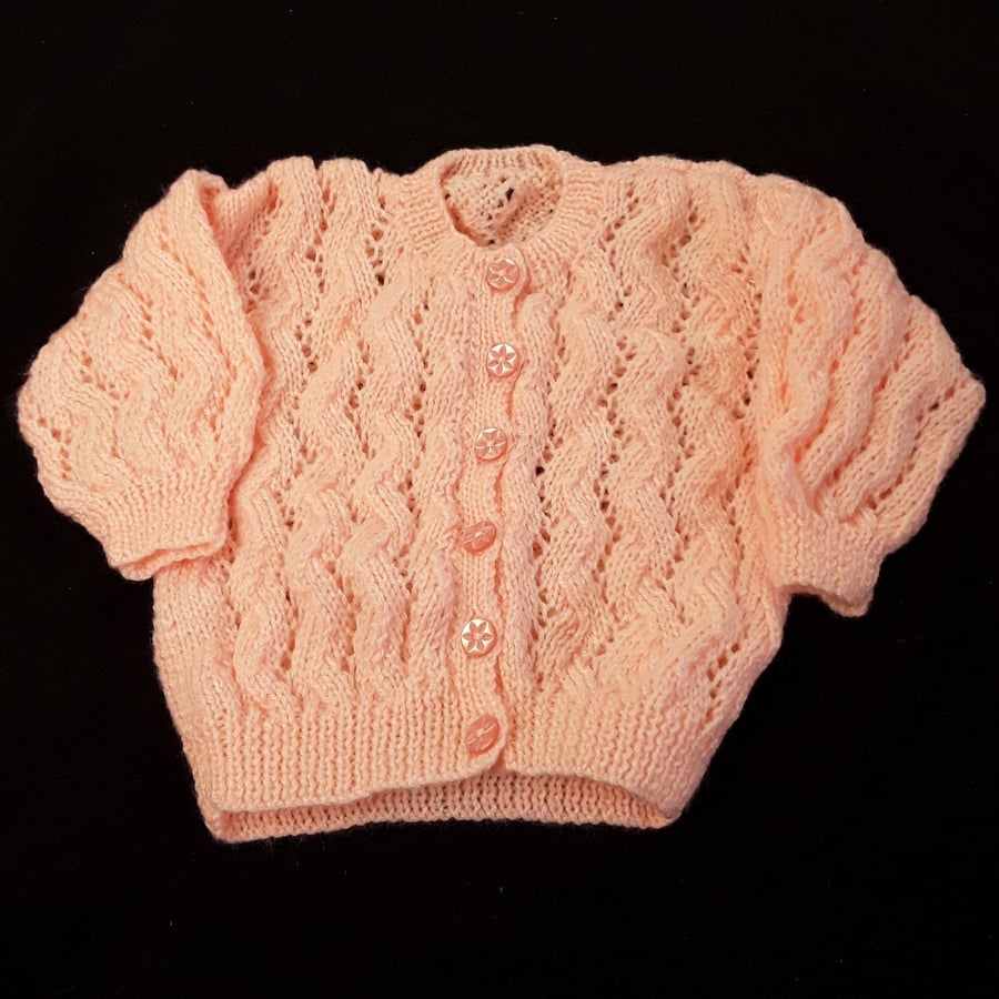 Hand knitted baby cardigan to fit 20 inch chest - peach - lacy pattern - knitted