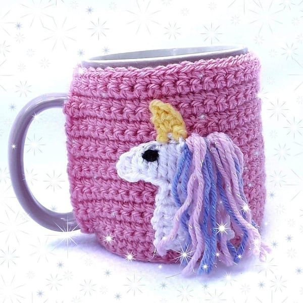 Hand crocheted mug cosy - pink with white unicorn with pink and blue sparky mane
