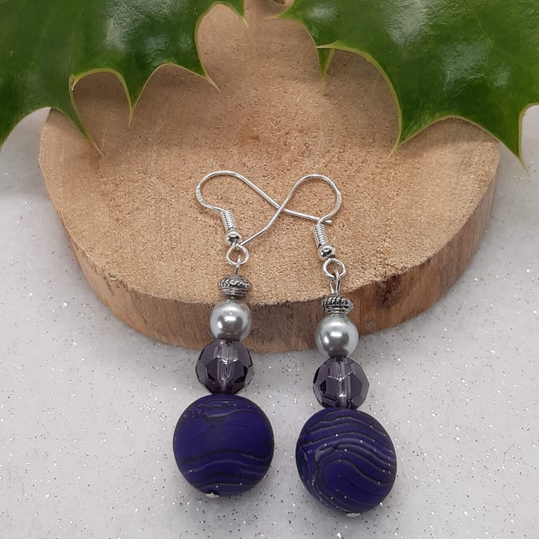 Sparkly purple dangly earrings
