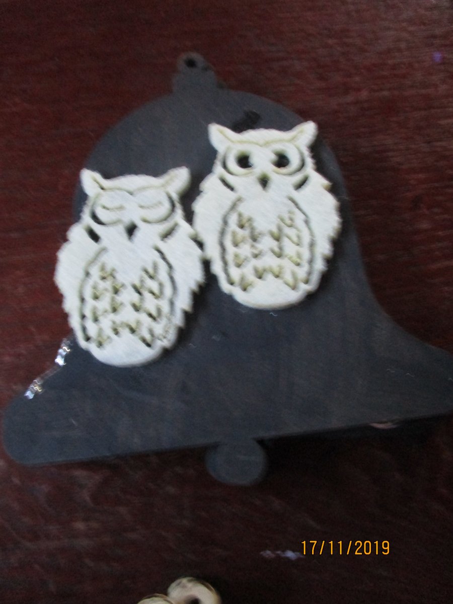 Owls on a Bell Plaque