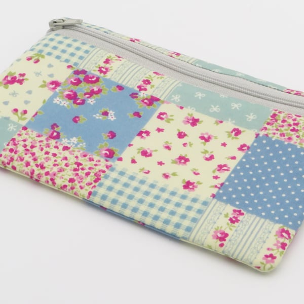 Zipped pouch for coins, storage, face masks or pencils.
