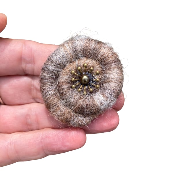 Needle felted spiral brooch in shades of beige and brown