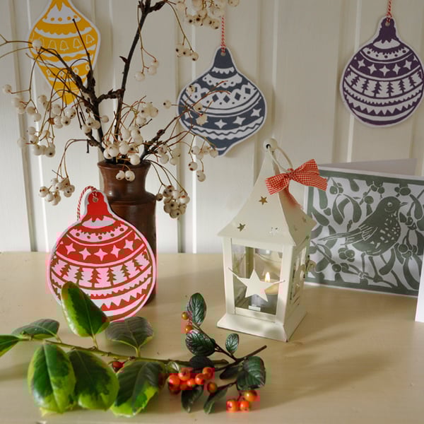 Two hand printed bauble Christmas cards or decorations.