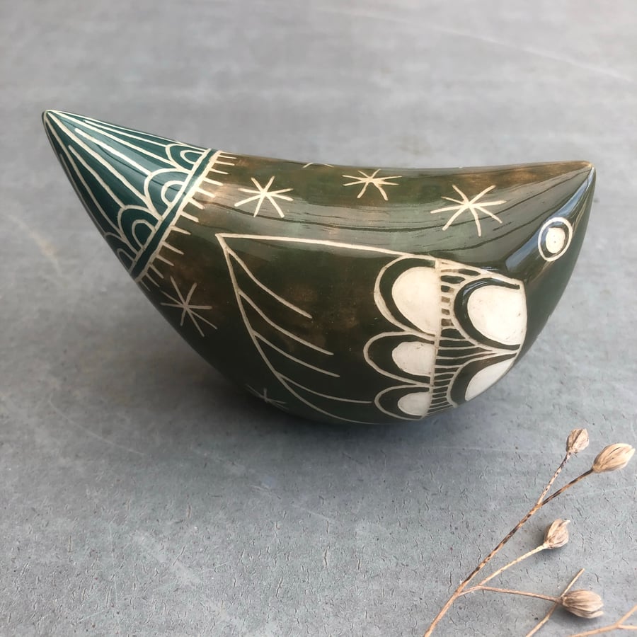 Lime green and dark green  ceramic bird .