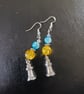 Silver lighthouse charm dangle earrings with yellow and blue beads - Image 4