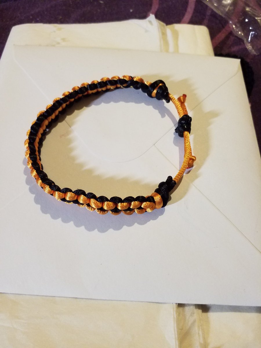 Handmade orange and black macrami bracelet, adjustable 