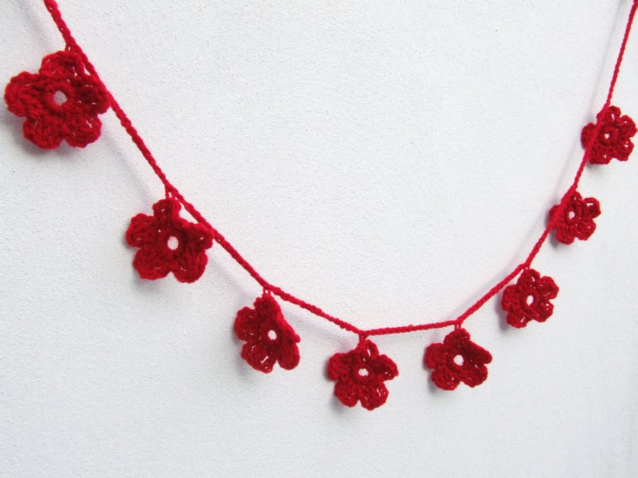 Red bunting decoration, red flower garland